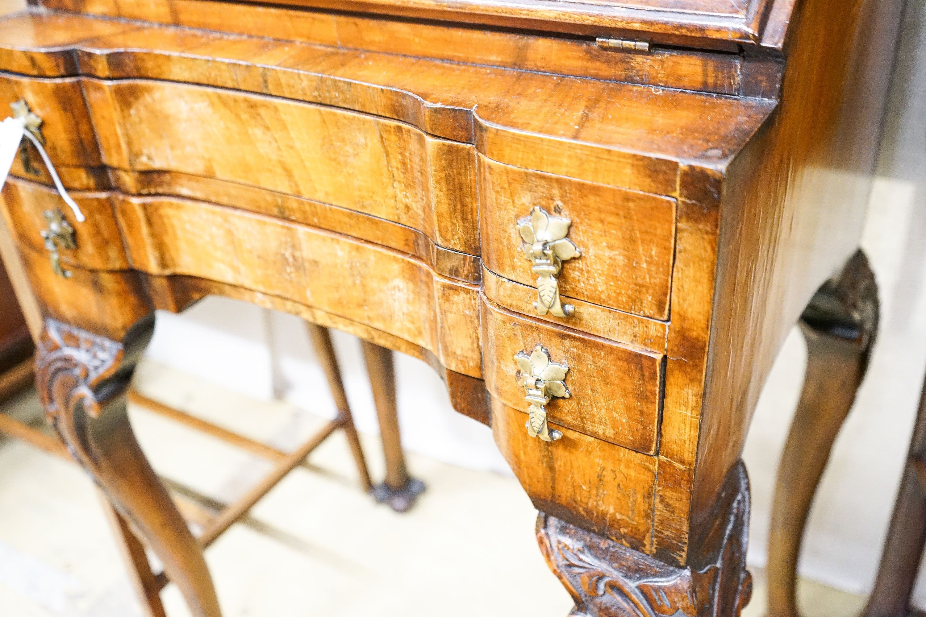 A small Queen Anne revival walnut bureau, width 52cm, depth 37cm, height 91cm together with an Edwardian satinwood banded folding mahogany card table